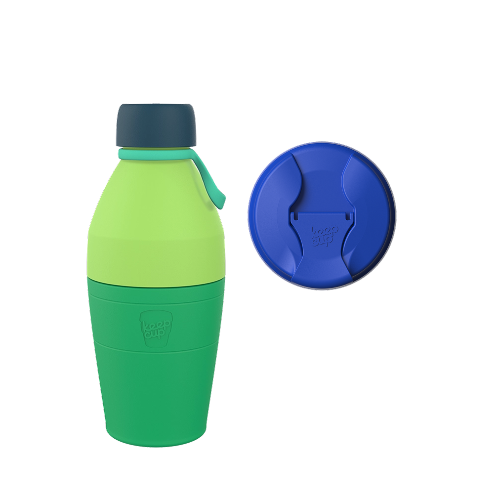 KeepCup Commuter Bundle M 18oz in Electric Blue featuring a green and lime two-tone bottle with dark navy cap and teal carrying loop, shown alongside a blue replacement lid viewed from above.