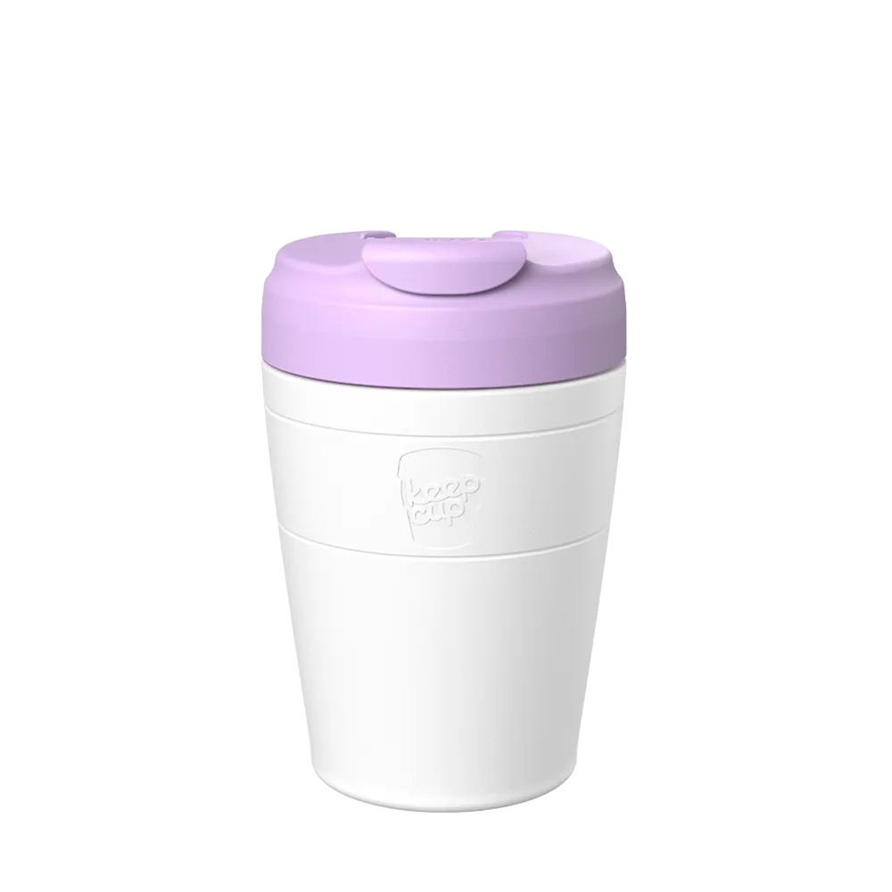 KeepCup Commuter M 12oz in White Lilac, featuring a white reusable cup  with a orchid lid and flip-top closure, shown in a front-facing product shot against a neutral background.