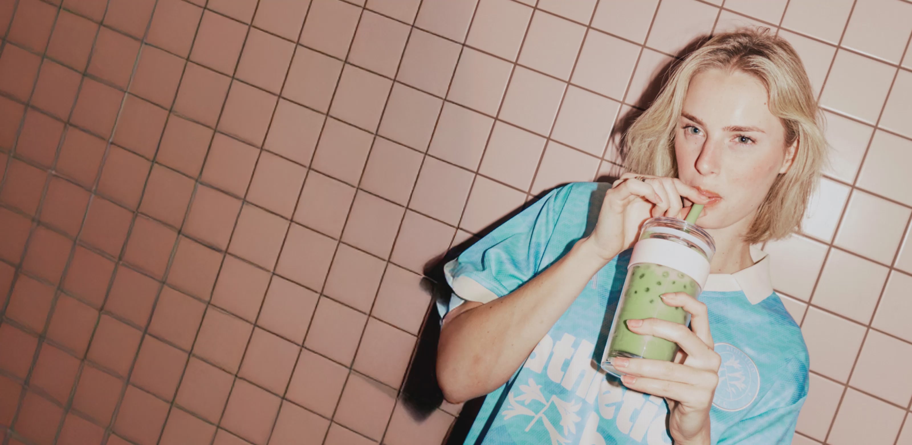 Load video: Collage of people enjoying beverages outdoors with a focus on KeepCups.