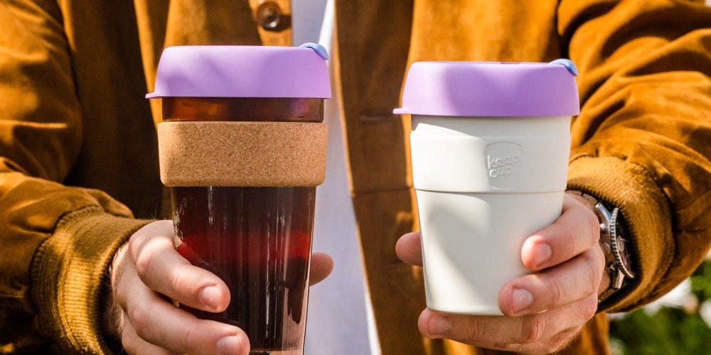 Man holding KeepCup Brew Cork and KeepCup Thermal